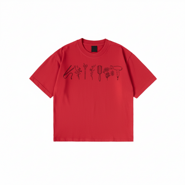 Hairstylist T-Shirt with floral salon tool print on black cotton fabric
