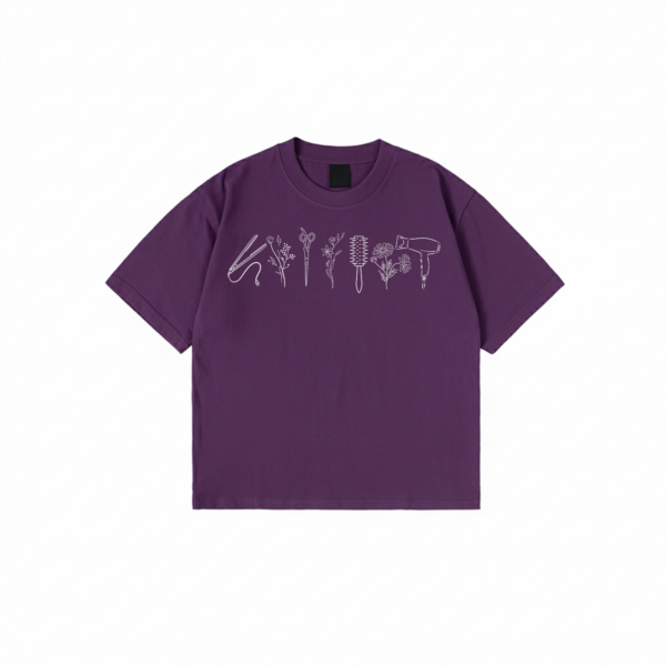 Hairstylist T-Shirt with floral salon tool print on black cotton fabric