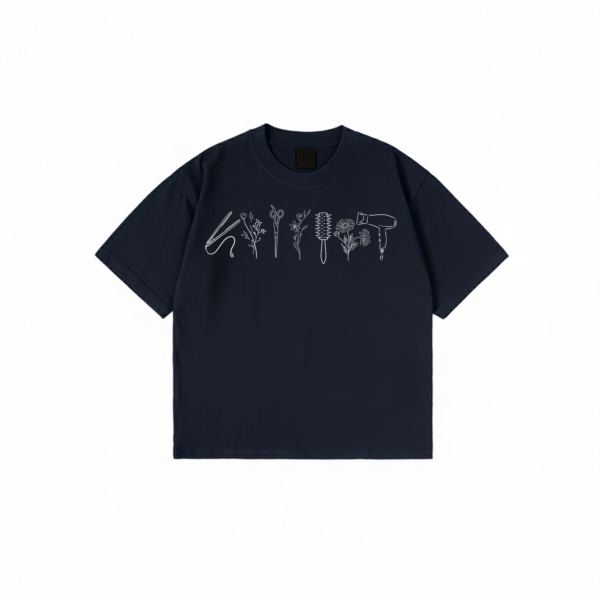 Hairstylist T-Shirt with floral salon tool print on black cotton fabric